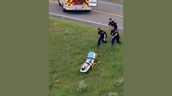Fact Check: FAKE Video Shows Paramedics Chasing Runaway Gurney