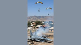 Fact Check: Fake Video Shows Crewmembers Parachuting After Ejecting From U.S. F-15 Fighter Jet Over Iran -- It's AI Generated