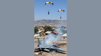Fact Check: Fake Video Shows Crewmembers Parachuting After Ejecting From U.S. F-15 Fighter Jet Over Iran -- It's AI Generated