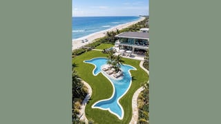 Fact Check: FAKE Video Shows Workers Creating A Dolphin-Shaped Swimming Pool -- It's AI