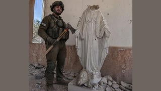 Fact Check: Image Of Axe-Hefting IDF Soldier Beside Headless Christian Statue Is NOT Real -- Picture Is AI-Generated