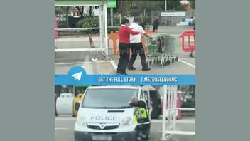 Fact Check: Staged Video Shows British Kids Locking Police Officer In Supermarket Shopping Carts -- Prank Skit