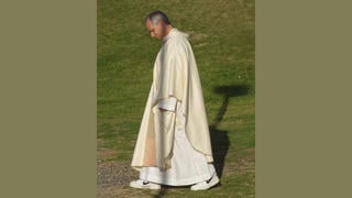 Fact Check: A Real Photo Shows Pope Leo XIV "Rocking Nikes With His Clerical Vestments" Prior To Being Elected Pope