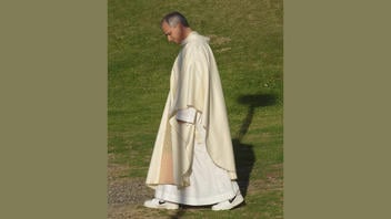 Fact Check: A Real Photo Shows Pope Leo XIV "Rocking Nikes With His Clerical Vestments" Prior To Being Elected Pope