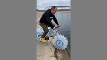 Fact Check: FAKE Video Shows Fictional Prototype For Floating Water Bicycle Made Of Recycled Plastic Bottles -- It's AI-Generated