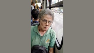 Fact Check: FAKE Video Shows Michael Jackson Sitting On A Bus In Brazil -- It's AI