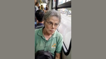 Fact Check: FAKE Video Shows Michael Jackson Sitting On A Bus In Brazil -- It's AI
