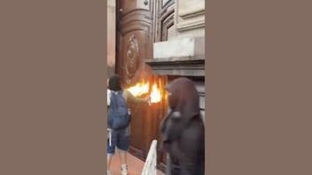 Fact Check: REUSED Video of Masked People With Torches Does NOT Show Church In UK's Yorkshire