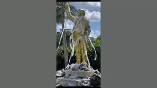 Fact Check: FAKE Photo Shows Golden Trump Statue Covered In Toilet Paper And Trash