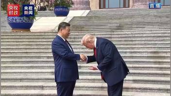 Fact Check: FAKE Photo Shows Trump Bowing To Xi As They Shake Hands -- It's Digitally Edited