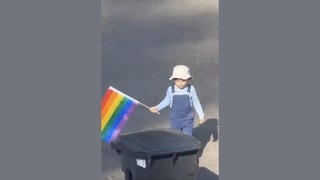Fact Check: FAKE Video Of Child Throwing LGBTQ+ Pride Flag In Trash Bin
