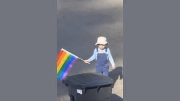 Fact Check: FAKE Video Of Child Throwing LGBTQ+ Pride Flag In Trash Bin