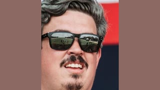 Fact Check: REAL Photo On Stage At Freedom 250 Concert Shows Only A Handful Of People Reflected In Mirror Sunglasses