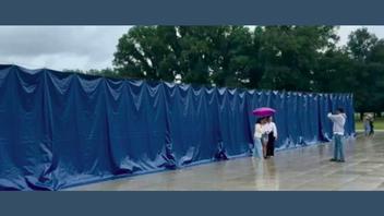 Fact Check: Photo Does NOT Show Blue Tarp Covering Fence Around Washington, D.C., Reflecting Pool During Late June 2026