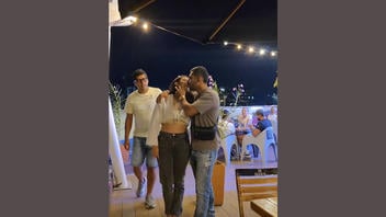 Fact Check: FAKE Video Of Man Catching Wife 'In The Act' Kissing Another Man -- It's Skit With Actors