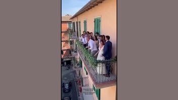 Fact Check: FAKE Video Shows A Wedding Party Fall To The Street When A Balcony Collapses -- It Is AI-Generated