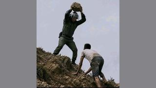 Fact Check: FAKE Image NOT From Reuters Shows Moroccan Officer Throwing Rocks At Migrant Returning From Ceuta 