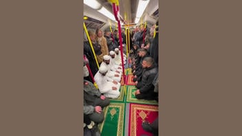 Fact Check: FAKE Video Shows Muslim Men Praying On The London Tube -- It's AI-Generated