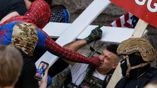 Fact Check: FAKE Image Shows Spider-Man Punching Jake Lang At A Minneapolis Protest -- It Is AI-Generated
