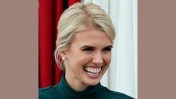 Fact Check: FAKE Image Shows Natalie Harp Smiling With Prominent Teeth And Gums -- Image Is AI-Altered