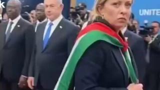 Fact Check: FAKE AI-Generated Video Shows Giorgia Meloni Wearing Palestinian Flag As Cape At UN