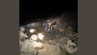 Fact Check: FAKE Image Of U.S. Troops Shooting 'Reptilians' Is NOT Real Photo